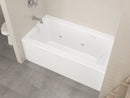 Venzi Madre 30 x 60 front skirted whirlpool bathtub installed in a bathroom