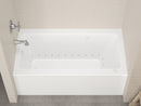 Venzi Madre 30 x 60 front skirted air jetted bathtub installed in a bathroom