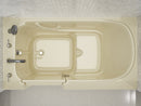 Venzi 32 x 60 walk-in soaking bathtub, left drain, biscuit in a bathroom
