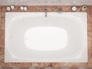 Venzi Aqui 48 x 72 rectangular soaking bathtub installed in a bathroom