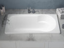 Venzi Elda 32 x 60 rectangular soaking bathtub installed in a bathroom