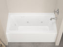 Venzi Madre 30 x 60 front skirted whirlpool bathtub installed in a bathroom