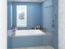 Venzi Flora 48 x 60 rectangular soaking bathtub installed in a bathroom