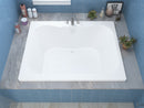 Venzi Flora 48 x 60 rectangular soaking bathtub installed in a bathroom