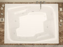 Venzi Capri 54 x 72 rectangular air & whirlpool bathtub installed in a bathroom